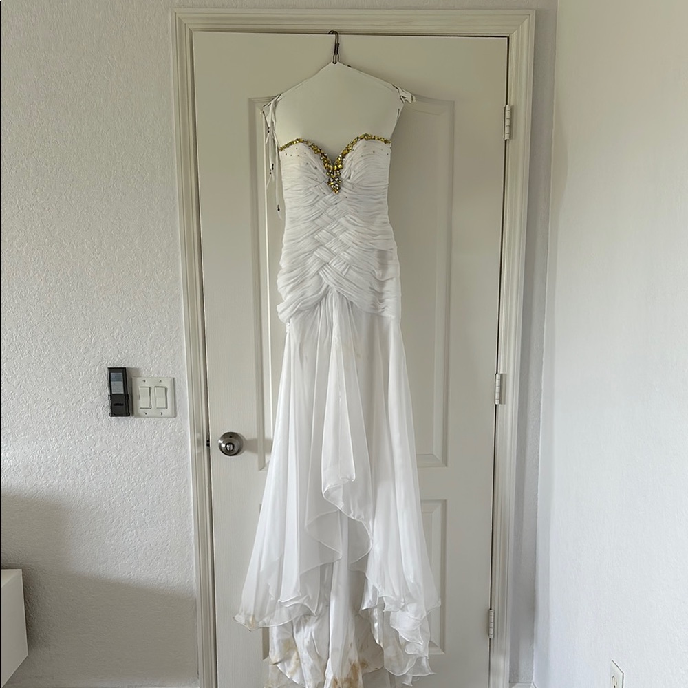 Elegant White Strapless Gown with Gold Accents